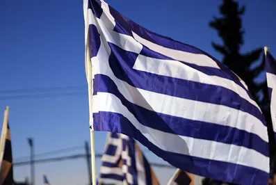 Fitch понизило рейтинг греческих банков до ограниченного дефолта