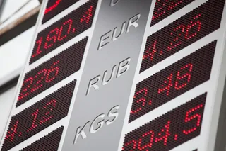 Капитал - До конца 2014 года девальвации тенге не будет