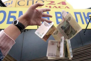 Капитал - Крым введет временное обращение двух валют