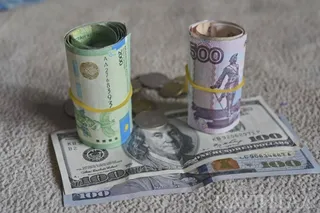 Капитал - Тенге вошел в число лидеров роста