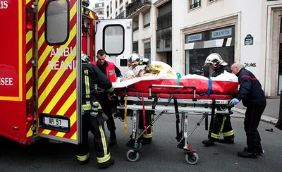 12 человек расстреляны в редакции французского  журнала