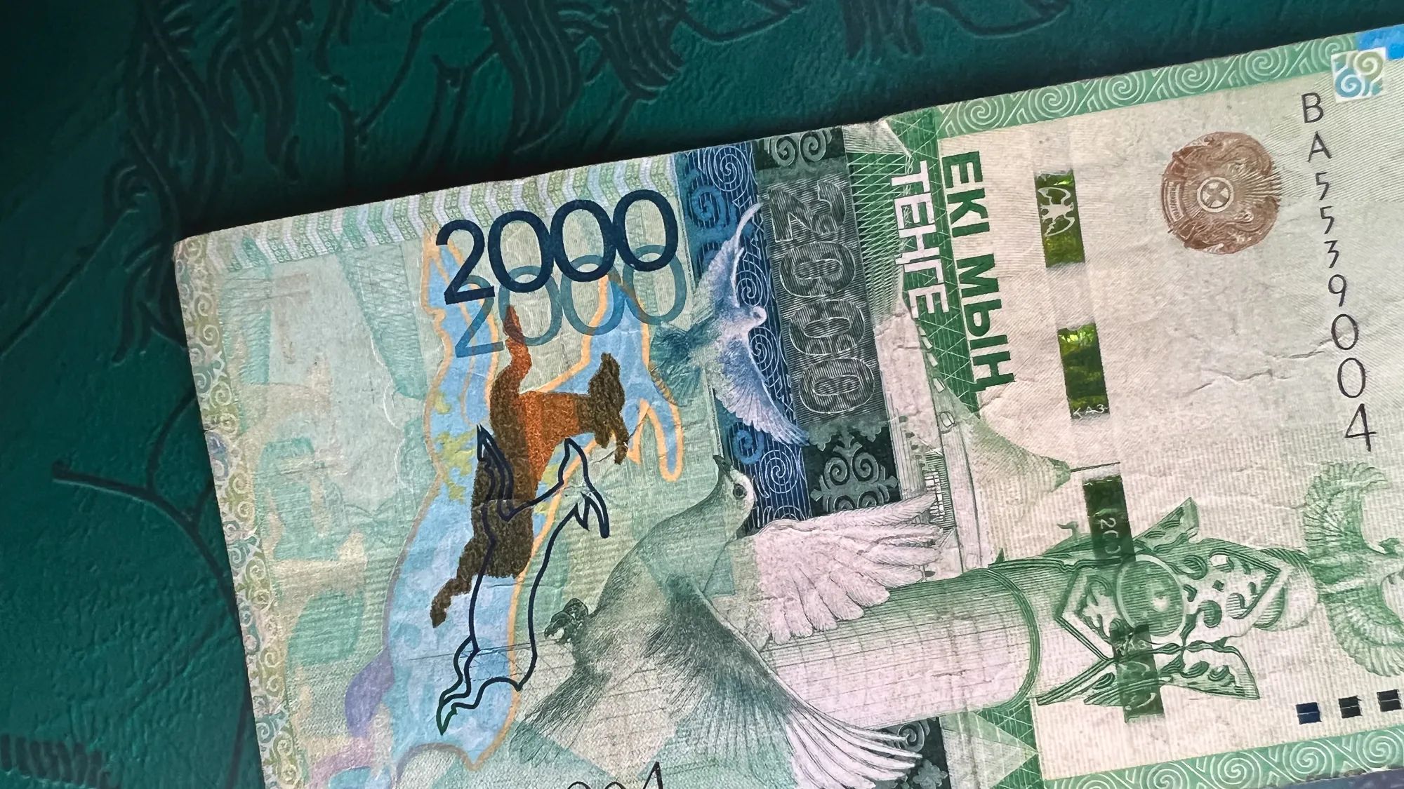 75 тенге в долларах