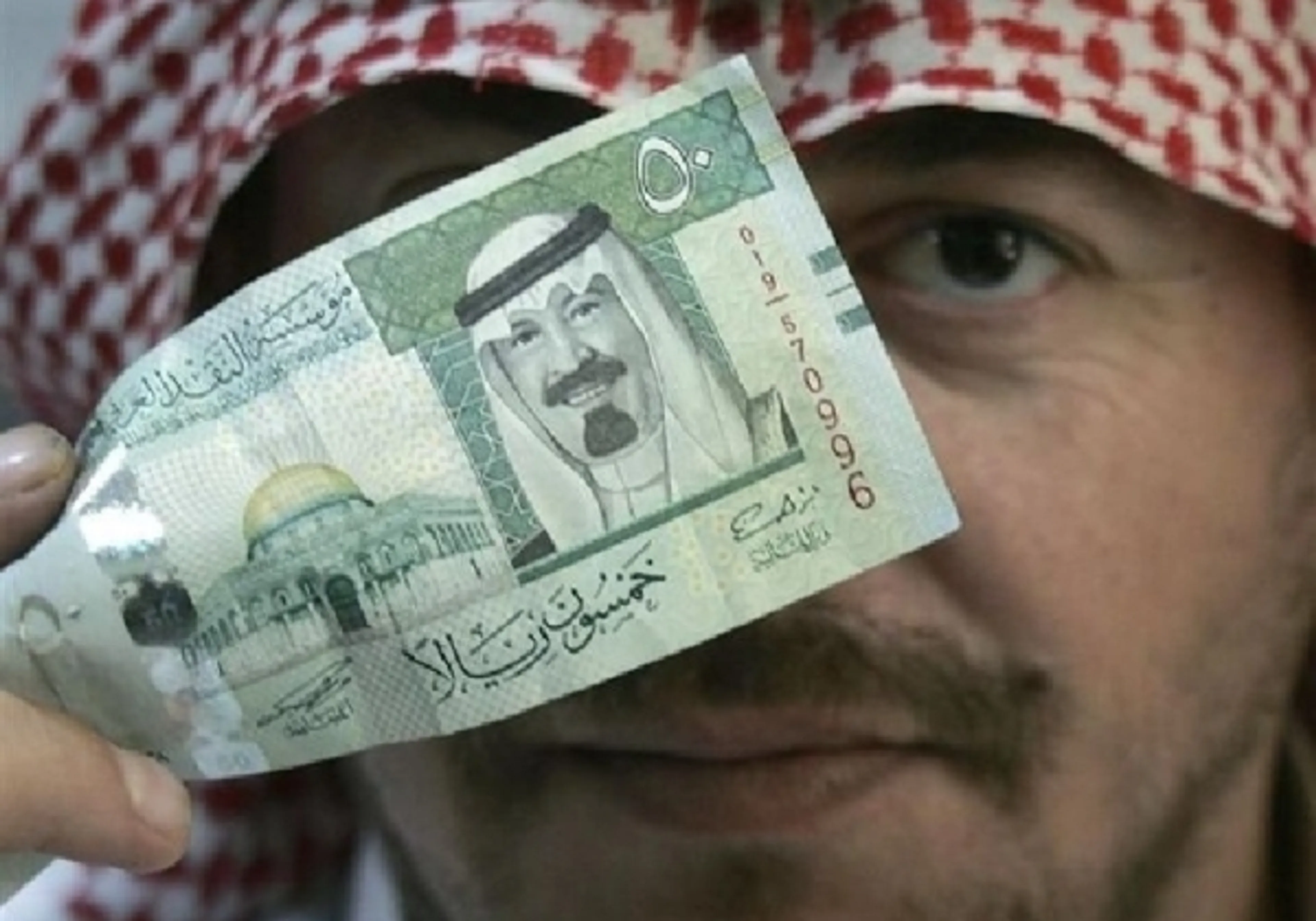 Капитал - Саудовская Аравия не исключает девальвации рияла