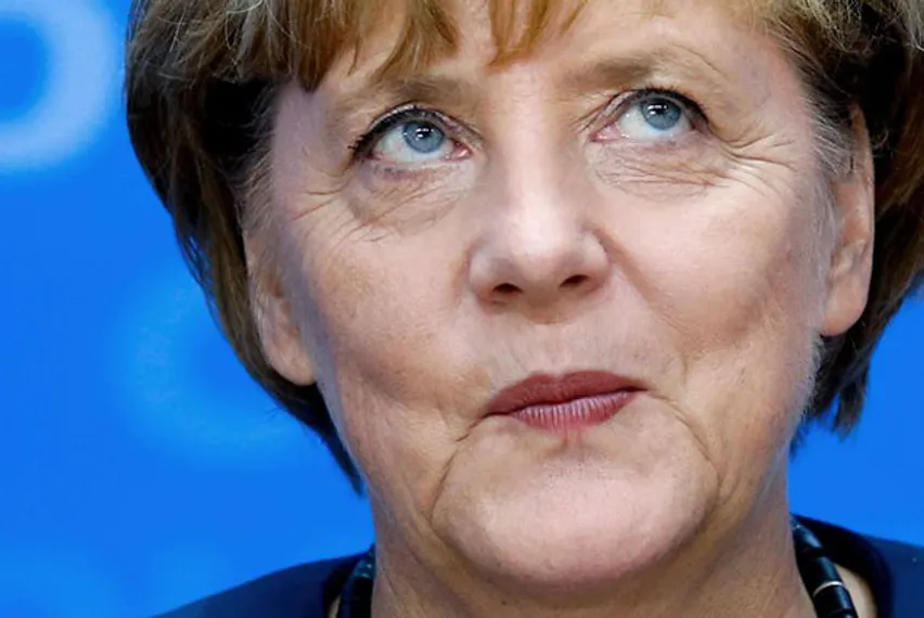 Капитал - Меркель признали человеком года за переговоры с Путиным