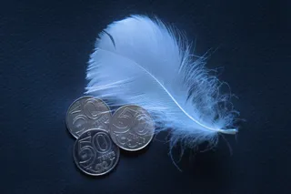 Капитал - Курс перед выходными составил 387,48 тенге за доллар