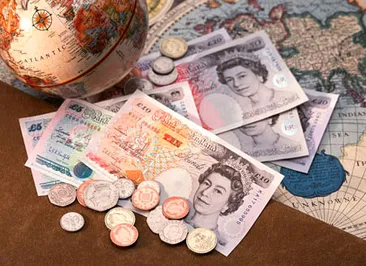 Англия может девальвировать фунт