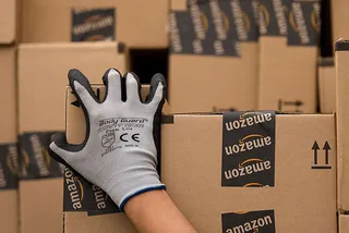 Капитал - Чистая прибыль Amazon составила $596 млн