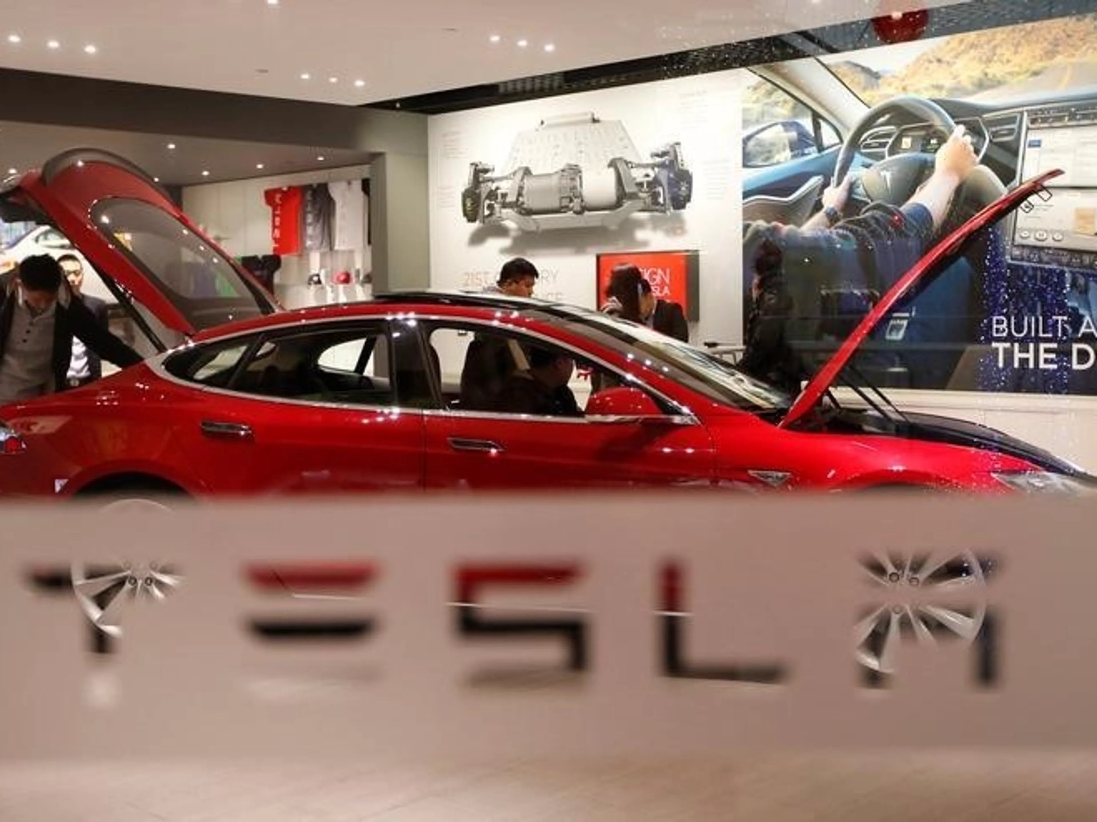 Капитал - Tesla продолжает копить убытки