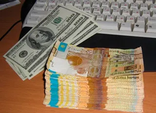 Капитал - Нацбанк будет сглаживать курс валютной корзины