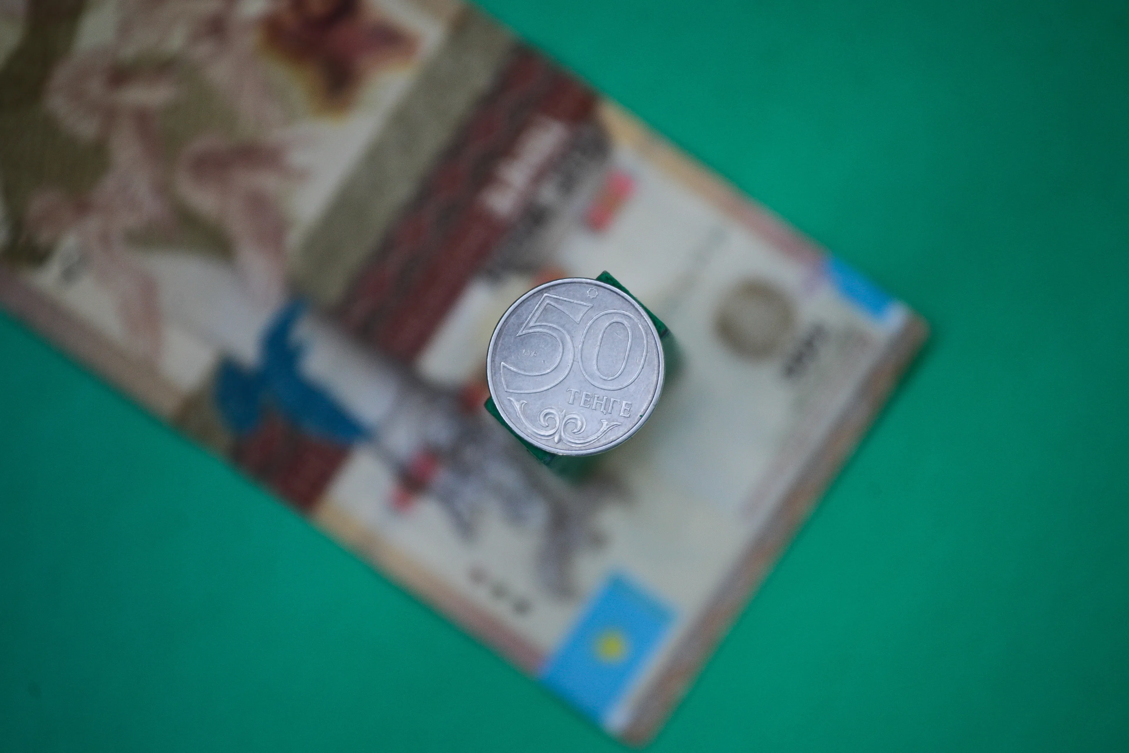 Капитал - Доллар на бирже торгуется по 387,11 тенге