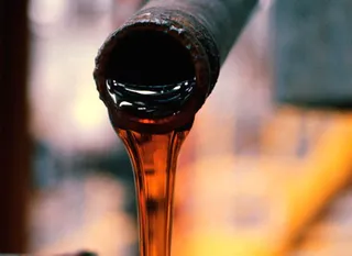 Капитал - МЭА снизило прогноз по спросу на нефть в 2014 г.