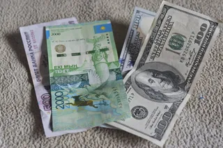 Капитал - Тенге удерживает уровень 311 за доллар