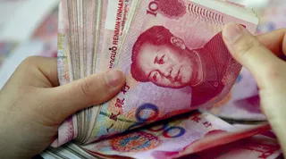 Капитал - Курс юаня в первый день торгов на KASE сильно не изменится