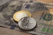 Средневзвешенный курс доллара на бирже составил 524,66 тенге