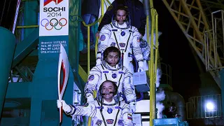 Капитал - Олимпийский огонь вернулся из космоса