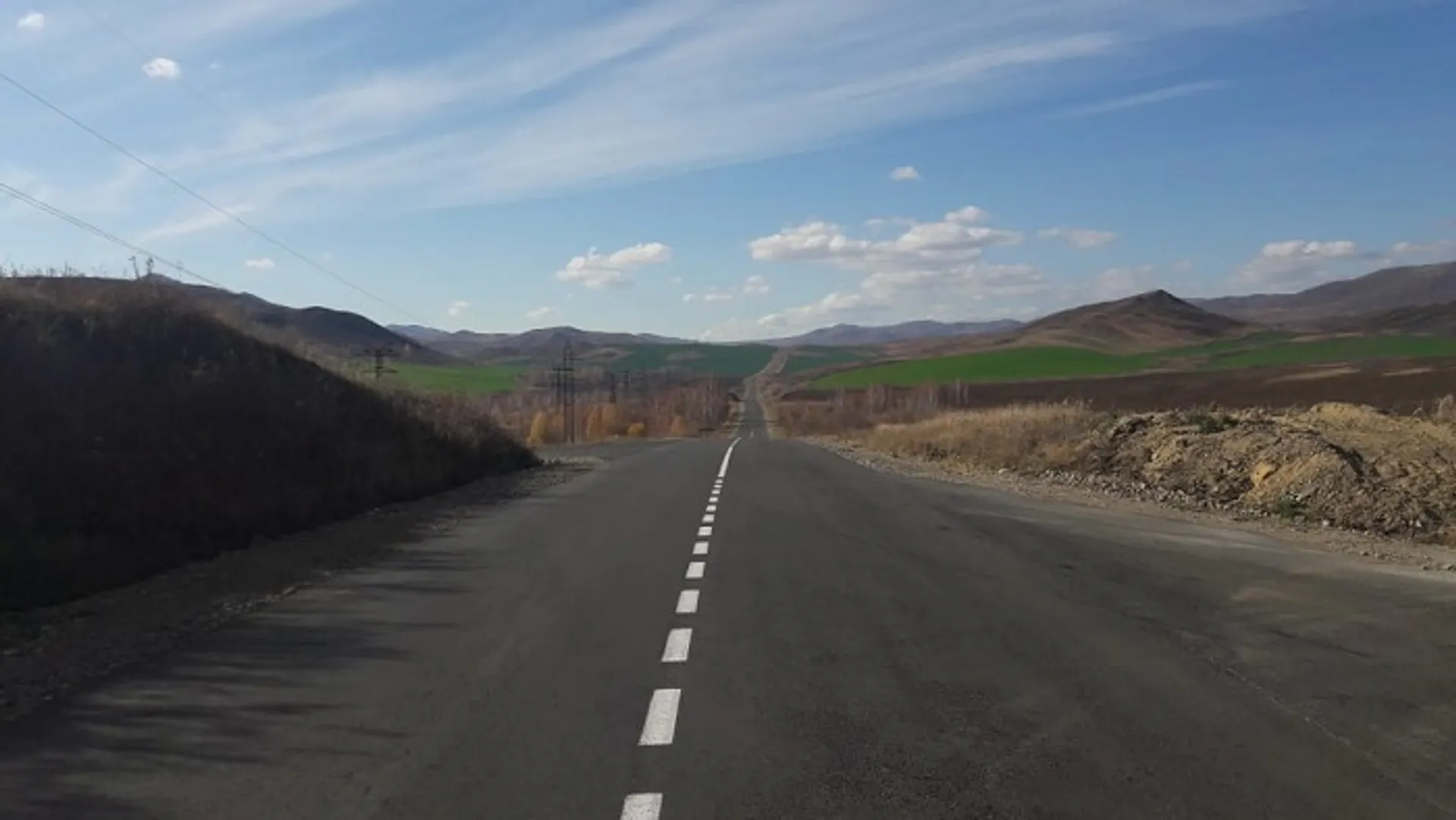 Капитал - Завершен ремонт 39 километров трассы, ведущей к Рахмановским ключам