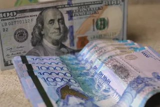 Капитал - Доллар вновь подешевел почти на 2 тенге