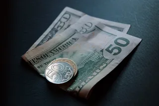 Капитал - Тенге немного укрепился к доллару