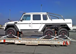 Капитал - Mercedes-Benz G 63 AMG превратили в трехосный пикап