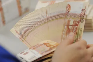 Капитал - В России ограничат объем ежедневных интервенций