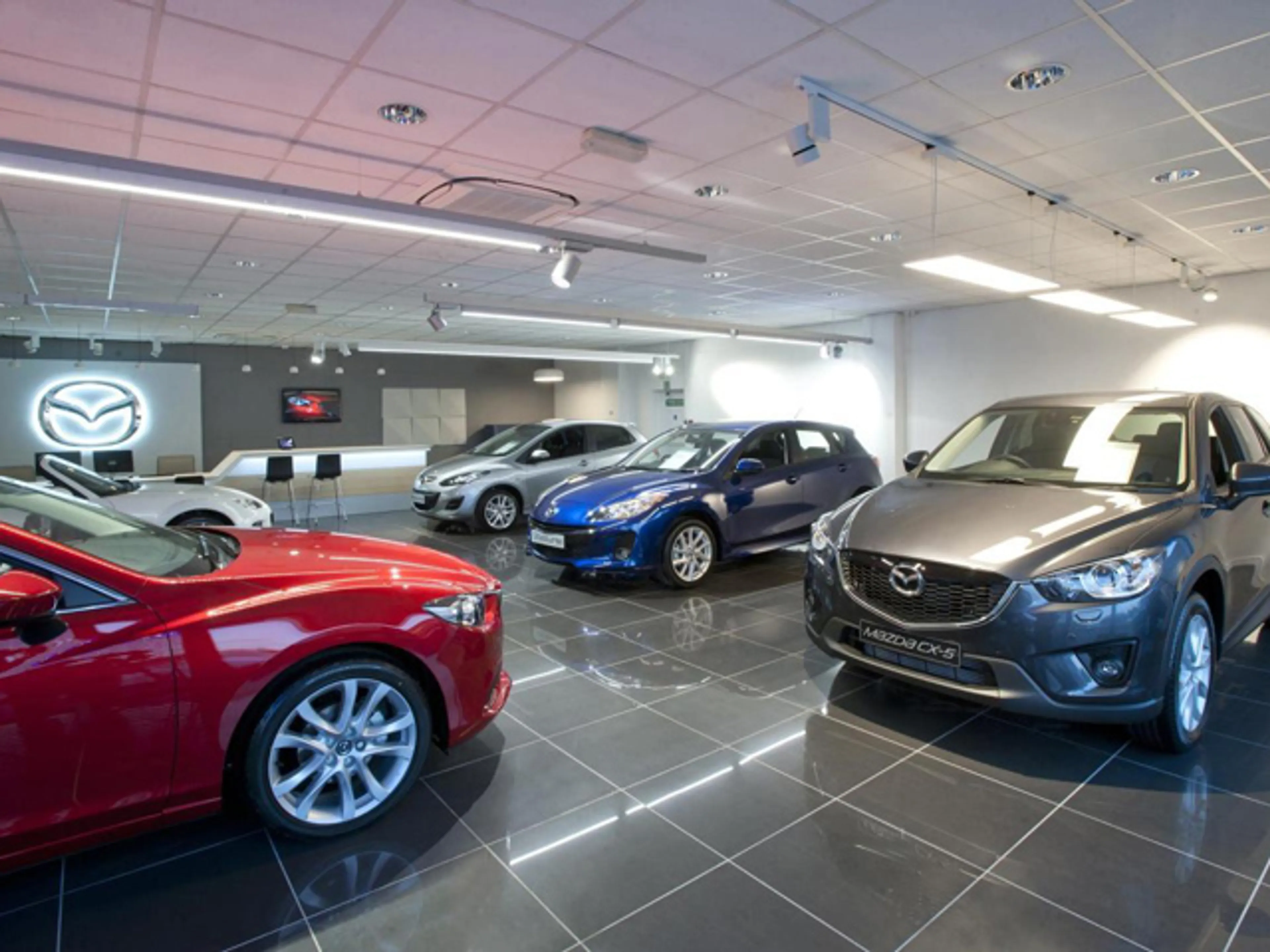 Капитал - Рекордные доходы Mazda