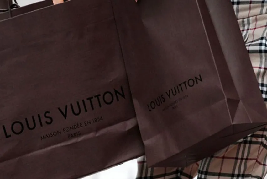Капитал - Louis Vuitton закрывает магазины в Китае