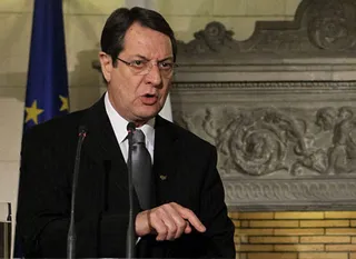 Капитал - Пересмотреть условия помощи просит Кипр