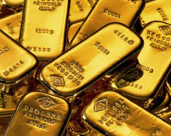 Золото подешевело на фоне негативных прогнозов