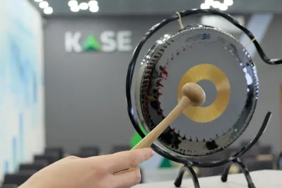 Двойной листинг на KASE и AIX приводит к потере ликвидности