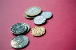 Капитал - Нацвалюта к доллару подешевела на 1,5 тенге