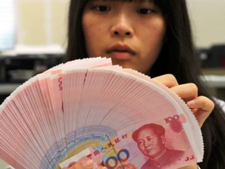 Капитал - Экономика Китая сбавила темпы роста