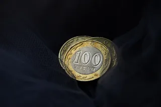 Капитал - Национальная валюта оказалась неповоротливой