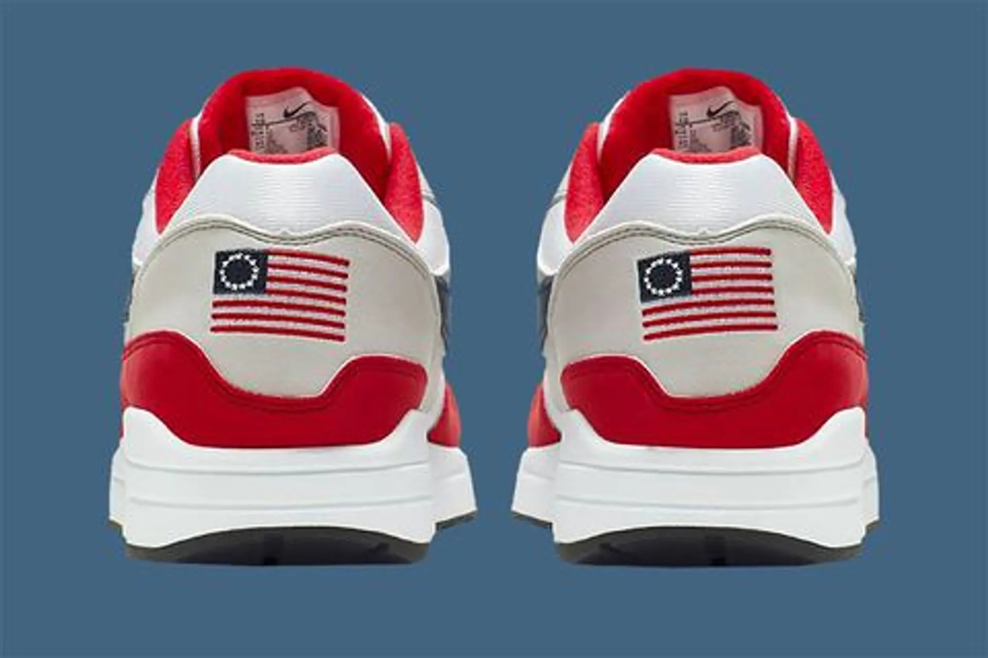Капитал - Nike прекратил продажу кроссовок с первым флагом США
