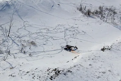 Появились фото с места крушения вертолета в Восточном Казахстане