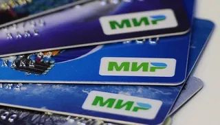 Капитал - Владимир Путин и администрация Кремля уже перешли на платежные карты «Мир»