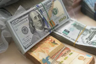 Капитал - Тенге к доллару незначительно укрепился на KASE