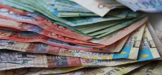 Капитал - Каждый третий казахстанец хранит деньги под матрацем