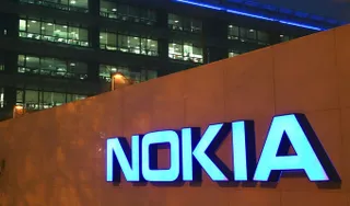 Капитал - Nokia сократила убытки и выручку