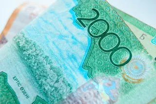 Капитал - Улучшение рейтинга Казахстана может помочь тенге укрепиться