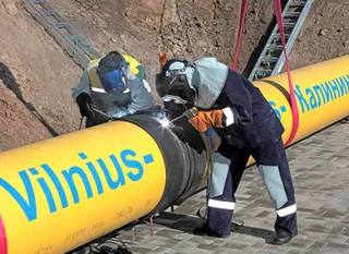 Капитал - Газпром предоставит Литве скидку на газ из-за страха