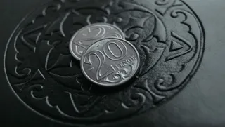 Капитал - Тенге дорожает вместе с нефтью