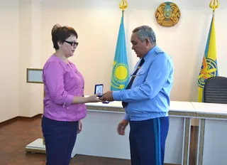 Капитал - Семья погибшего летчика получила квартиру в Астане