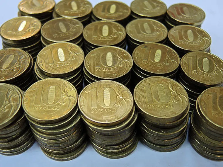 Капитал - Минфин России предложил девальвировать рубль на 10%