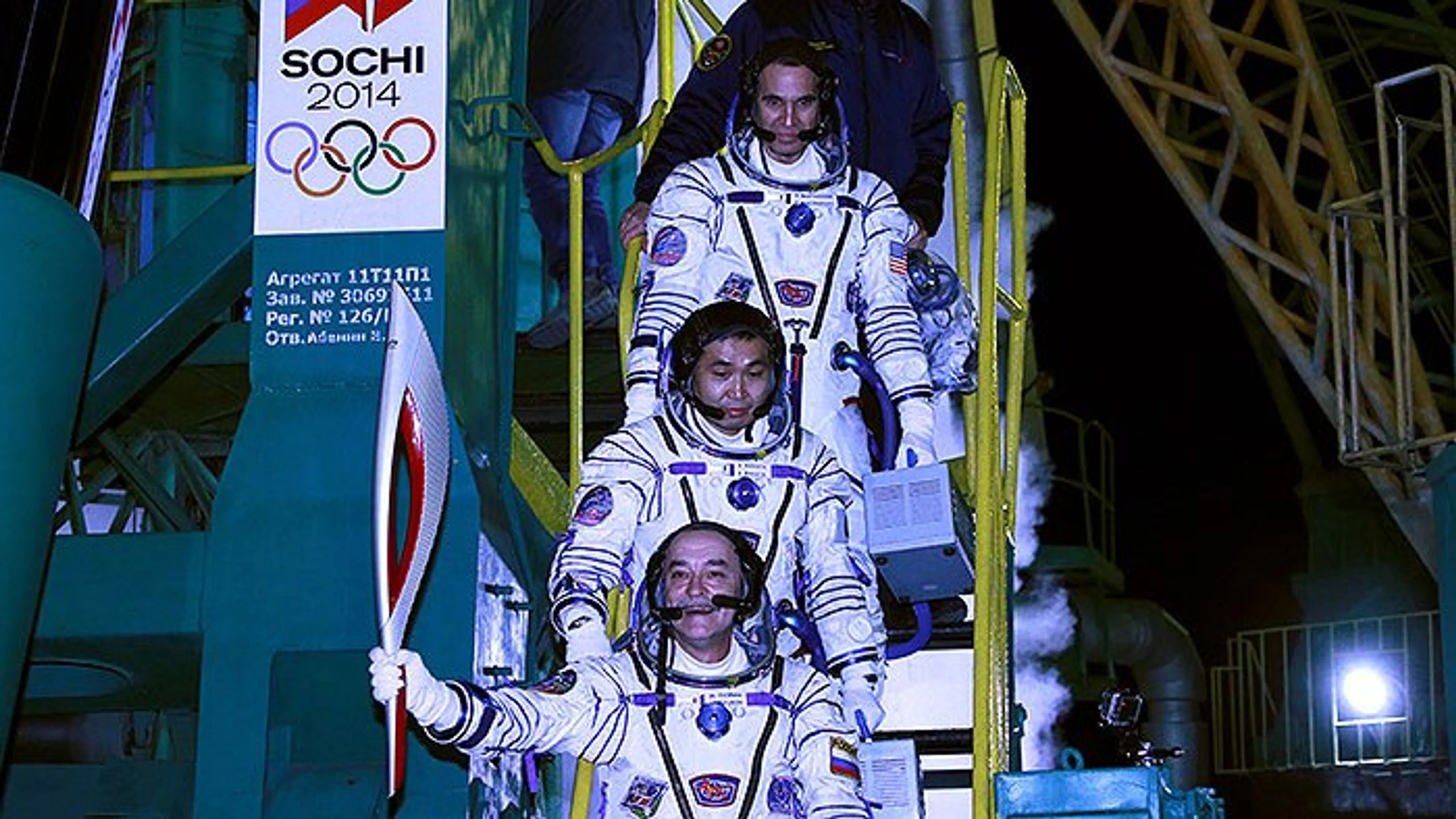 Капитал - Олимпийский огонь вернулся из космоса