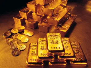 Капитал - Золото выросло на международных рынках