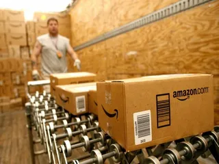Капитал - Чистая прибыль Amazon снизилась на 37%