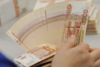 Капитал - Курс доллара снизился почти на рубль