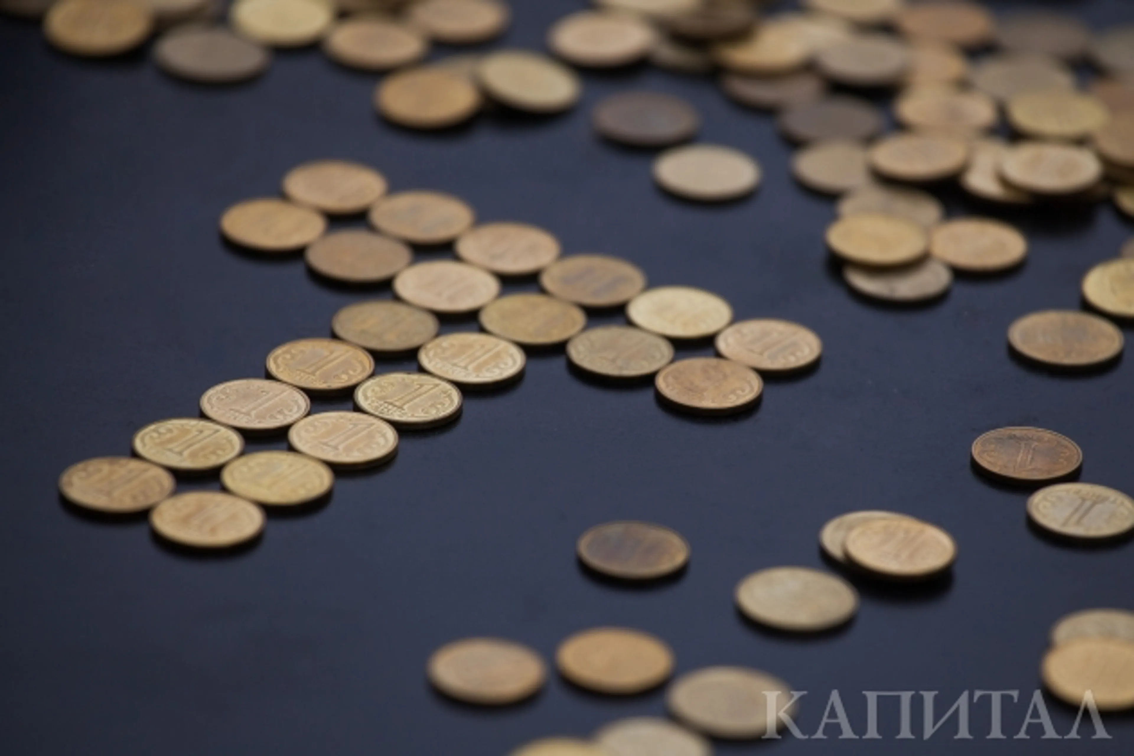 Капитал - Курс доллара удерживает позиции на бирже - 387,42 тенге