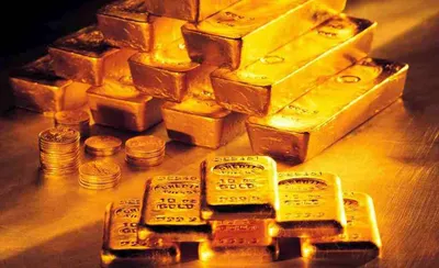 Золото подешевело на мировых рынках