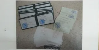 Капитал - В Алматы работал мини-цех по изготовлению поддельных документов